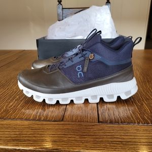 On Running/ Cloud Hi, size 10.5 in box  -  Worn twice. - Color is Navy/Brown